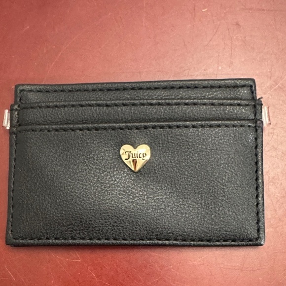 Juicy Couture Handbags - 3/$22
Juicy Couture Black Card Holder with Silver Heart